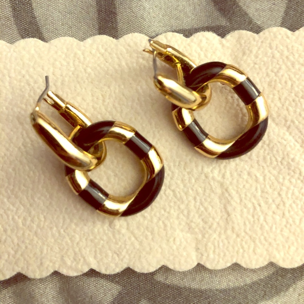 Kate Spade black and gold fashion earrings.
